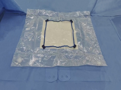 What is a fenestrated drape equipped with fluid collection bag